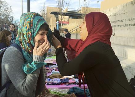 A visible sign of Muslim identity, such as a hijab, can be associated with foreignness.
              AP Photo/Russell Contreras