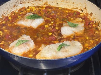 The cod’s mild flavor and flaky white texture let the bright sauce take center stage. (Diane Rossen Worthington/TCA)