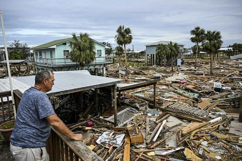 Hurricane Helene left a mess when it made landfall in Horseshoe Beach, Fla., on Sept. 28, 2024. Some homes fared better than others.
              Chandan Khanna/AFP via Getty Images