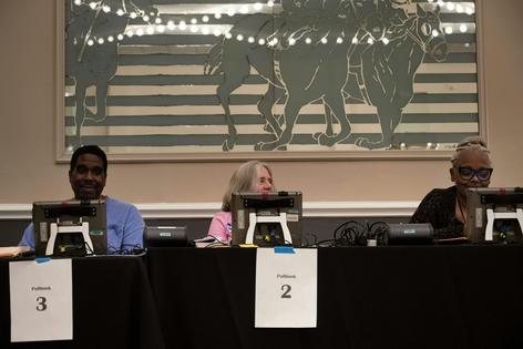 Poll workers want you to vote. But sometimes there are problems.
              Brendan Smialowski/AFP via Getty Images