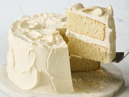 This classic white cake is flavorful and nearly foolproof thanks to a few clever techniques. (Alex Lepe/TCA)