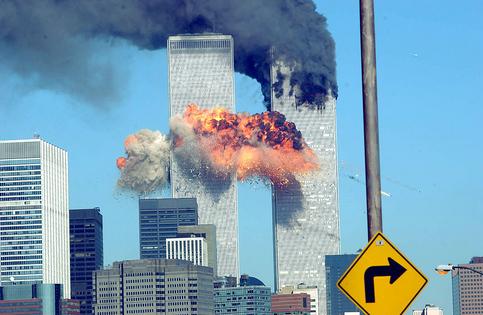 394261 14: A fiery blasts rocks the World Trade Center after being hit by two planes Sept. 11, 2001 in New York City. (Photo by Spencer Platt/Getty Images)