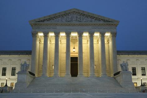 The Supreme Court justices are considering an extremely consequential and controversial case regarding mail-in voting.
              Kevin Carter/Getty Images