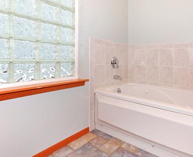 A glass block unit allows light in from the outside while providing privacy inside. (Dreamstime/TCA)