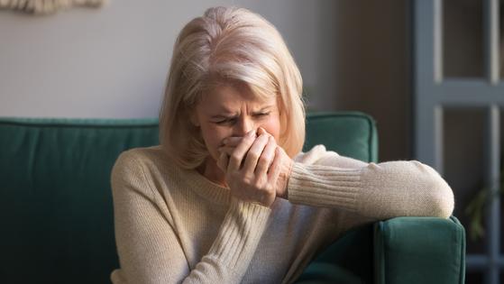 Grieving woman. Dreamstime/TCA