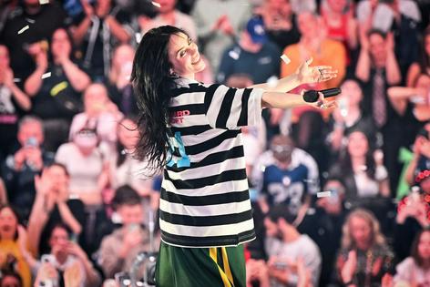 Billie Eilish, who has been open about living with Tourette syndrome, performs in Stockholm, Sweden.
              Samir Hussein/WireImage via Getty Images