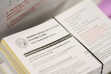 Absentee voting instructions for mail-in ballots are seen at the Wake County Board of Elections on Sept. 3, 2026, in Raleigh, N.C.
              AP Photo/Matt Ramey