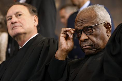 Justices Samuel Alito, left, and Clarence Thomas, right, dissented on the Sept. 14 Supreme Court opinion and would have allowed the USPS rules to go into effect.
              Chip Somodevilla/POOL AFP, Getty Images