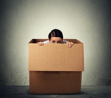 Shy woman. Dreamstime/TCA