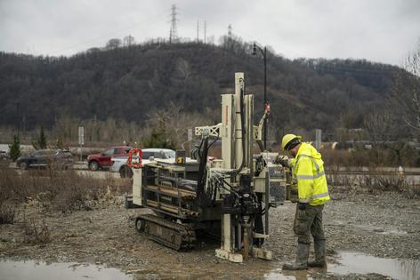 A technician pulls soil samples.
              Kevin Lorenzi/Mellon College of Science via Carnegie Mellon University