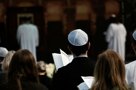 People attend Yom Kippur services hosted by Temple Emanu-El on Sept. 16, 2021, in New York City. Spencer Platt/Getty Images