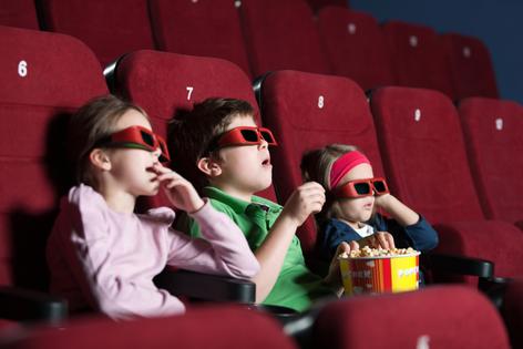 Kids at movie theater. Dreamstime/TCA