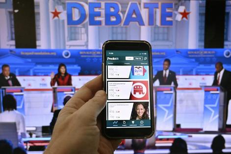 Prediction markets are playing a growing role in political forecasting.
              Olivier Douliery/AFP via Getty Images