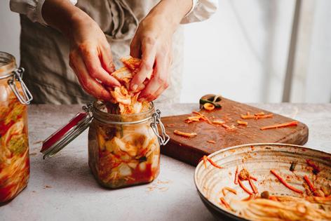 Kimchi is a fermented food that can help spice up a dish and your gut microbiome.
              alvarez/E+ via Getty Images