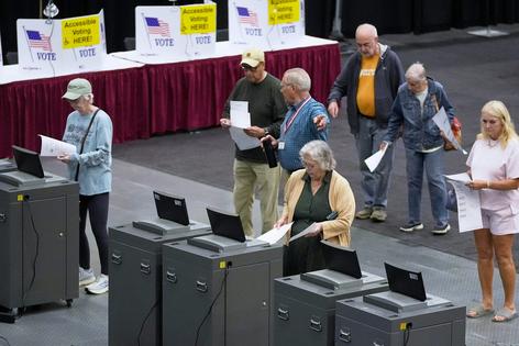 Voters cast their primary ballots in Augusta, Maine, on June 9, 2026,   AP Photo/Robert F. Bukaty