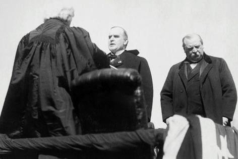 President Grover Cleveland, right, looks down during William McKinley's presidential inauguration in 1897. Two years earlier, Cleveland's political party suffered the biggest defeat in U.S. history during the 1894 midterms. Library of Congress via AP