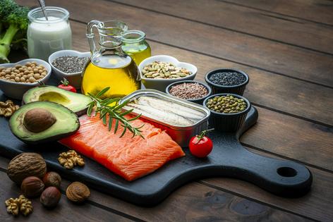 Foods like olive oil, avocados, salmon, sardines, chia seed and nuts can improve cholesterol levels.
              fcafotodigital/iStock via Getty Images