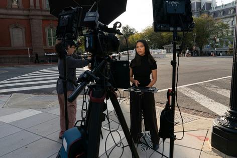Reporter Akayla Gardner reports near the White House after being denied entry following President Donald Trump's ban on CNN, MS NOW and Politico, Sept. 19, 2026. AP Photo/Jose Luis Magana