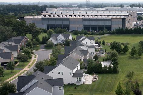 People who live near data centers in northern Virginia have opinions about how to manage them. Brendan Smialowski/AFP via Getty Images