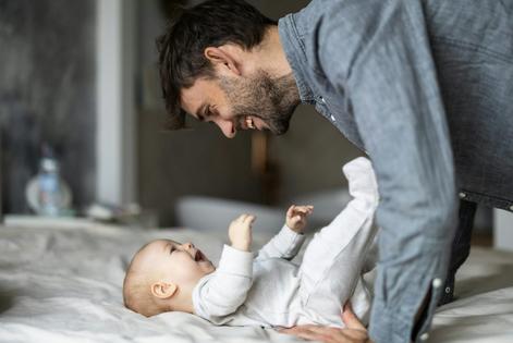 Paid leave gives fathers time to bond with their children and improves their mental health. Piksel/iStock via Getty Images Plus