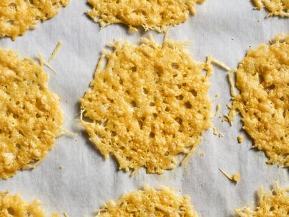 A little oven time turns Parmesan cheese into the crispiest, laciest one-ingredient cracker ever. (Joe Lingeman/TCA)