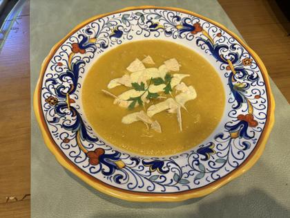 Silky cauliflower soup gets a sweet-tangy finish with mango yogurt and crisp papadums. (Diane Rossen Worthington/TCA)