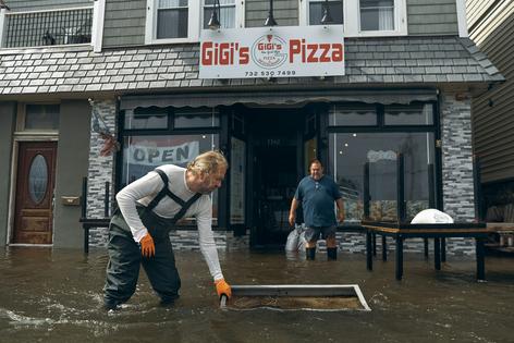 A nor'easter's storm surge swept into restaurants and homes in Sea Bright, N.J., in late September 2026.  AP Photo/Andres Kudacki