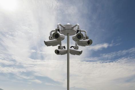 Flock cameras capture a vehicle’s license plate, location and distinguishing marks down to dents or a bumper sticker. Buena Vista Images/Getty Images
