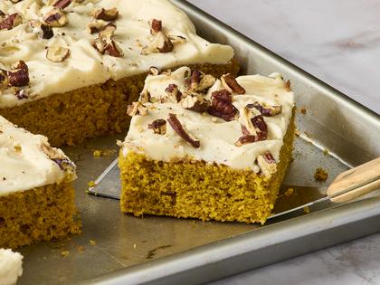 All the warm, cozy flavors of pumpkin and fall spices baked into an easy, tender sheet cake topped with a rich, nutty brown butter cream cheese frosting. (Alex Lepe/TCA)