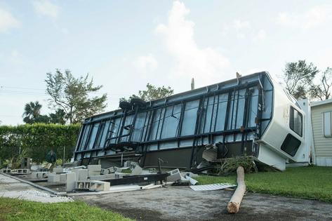 Hurricane Irma’s winds pushed mobile homes off their pad at the Enchanted Shores manufactured home park in Naples, Fla., in September 2017.
Nicholas Kamm/AFP via Getty Images