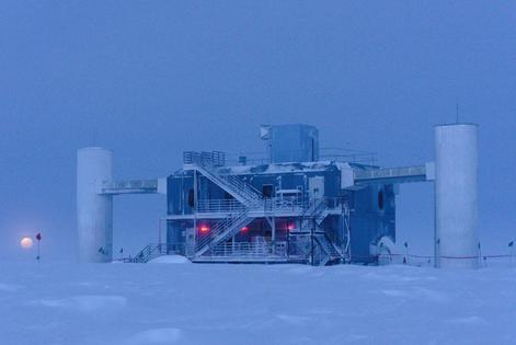 The Moon rises behind the IceCube Neutrino Observatory at the South Pole. Alicia Fattorini, IceCube/NSF