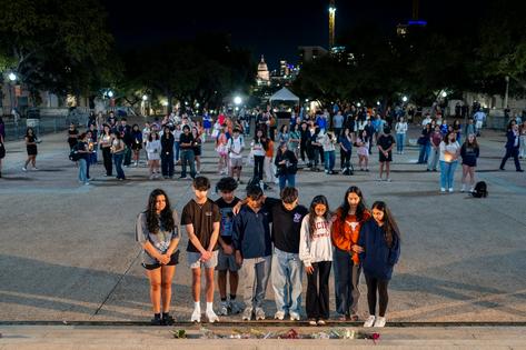 Students at the University of Texas at Austin hold a candlelight vigil in March 2026 for the victims of a mass shooting at a bar in downtown Austin.
Brandon Bell/Getty Images News via Getty
