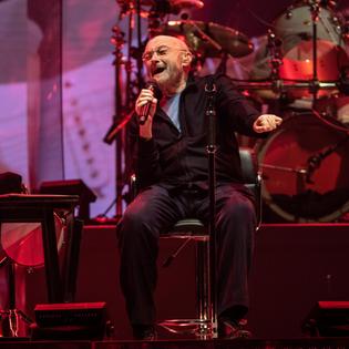 Bang Showbiz / Phil Collins is heading to a meeting with Oasis brothers Liam and Noel Gallagher.