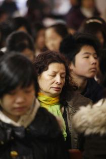 People attend Sunday services at the Church of Grace to Fujianese in New York in 2010.
              Najlah Feanny/Corbis via Getty Images