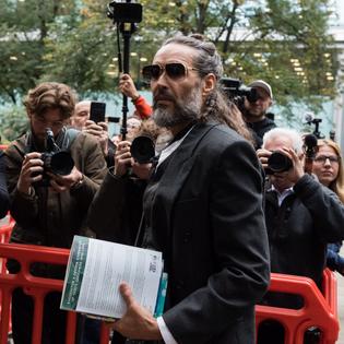 Bang Showbiz / Russell Brand prays before court every day