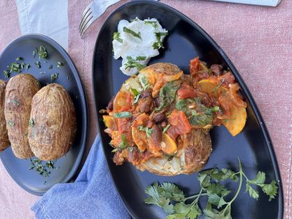Crispy jacket potatoes make a hearty meal for cool fall evenings. (JeanMarie Brownson/TCA)