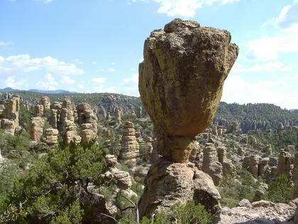 A large rock balanced atop another is one of the striking features of the Chiricahua landscape. Pretzelpaws via Wikimedia Commons, CC BY-SA