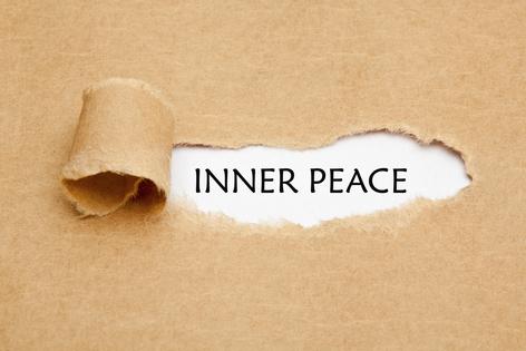 Inner peace ripped paper concept. Dreamstime/TCA