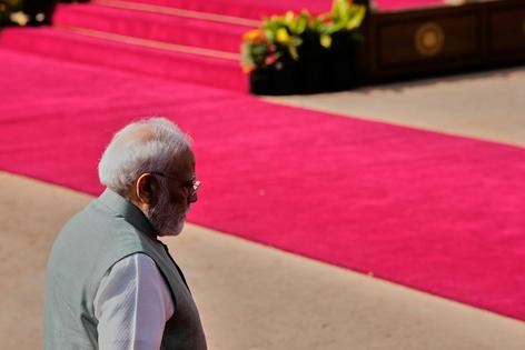 Indian Prime Minister Narendra Modi arrives at the presidential palace in New Delhi, India, on Oct. 5, 2026.
              AP Photo/Manish Swarup