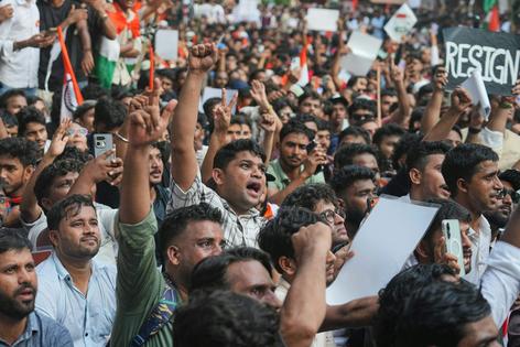 CJP supporters take part in a protest against Chief Election Commissioner Gyanesh Kumar in Mumbai, India, on Oct. 2, 2026.
              AP Photo/Rafiq Maqbool