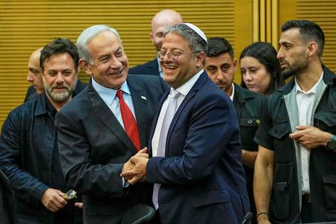 National Security Minister Itamar Ben-Gvir, seen here with Israeli Prime Minister Benjamin Netanyahu in 2023, is also head of the Jewish Power party.
              AP Photo/Ohad Zwigenberg