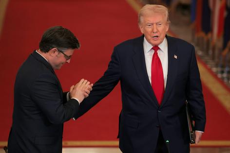 Speaker Mike Johnson, left, leader of House Republicans, with President Donald Trump.
              Anna Moneymaker/Getty Images