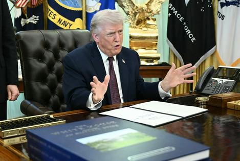 President Donald Trump speaks before signing an executive order on election integrity in the Oval Office on March 31, 2026.
Brendan Smialowski/AFP via Getty Images