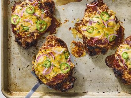 Chicken cutlets are breaded, fried, covered in barbecue sauce and shredded cheddar (chicken Parmesan-style), then broiled to cheesy, crispy perfection. (Alex Lepe/TCA)