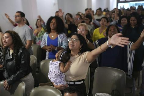 Brazilian Christians pray during a service at the Assembly of God Victory in Christ evangelical church in Rio de Janeiro on Aug. 27, 2025.
AP Photo/Silvia Izquierdo