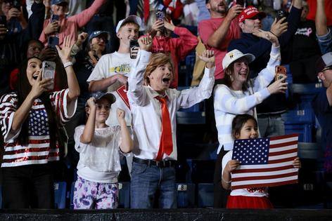 Audience members cheer as President Donald Trump delivers remarks during a campaign rally at Crossroads Arena on Oct. 26, 2026, in Corinth, Miss. Chip Somodevilla/Getty Images