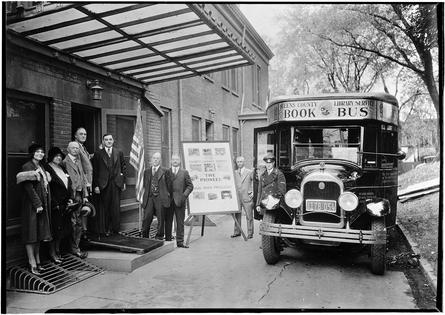 President-elect Franklin D. Roosevelt stands with a Queens book bus in 1932. MCNY/Gottscho-Schleisner/Archive Photos via Getty Images