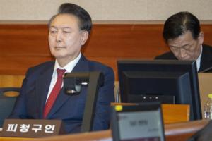 Song Kyung-Seok/Pool/AFP/Getty Images North America/TNS
