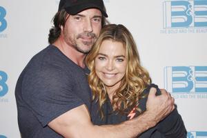 Bang Showbiz / Aaron Phypers and Denise Richards have split