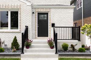Fence companies sell and install custom ornamental iron fencing, and lumberyards and home centers sell precut railing sections and components. (Dreamstime/TCA)